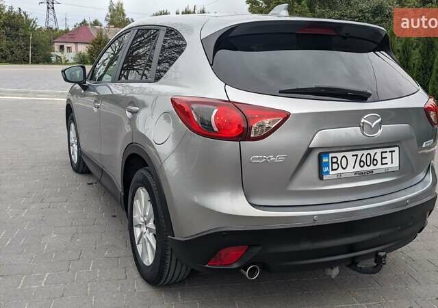 Мазда СХ-5 2012 в Кременце на Automoto.ua Серый Мазда СХ-5, объемом двигателя 2.2 л и пробегом 228 тыс. км за 13000 $, фото 16 на Automoto.ua