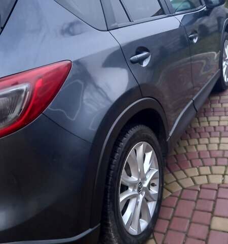 Серый Мазда СХ-5, объемом двигателя 2.19 л и пробегом 225 тыс. км за 14300 $, фото 3 на Automoto.ua