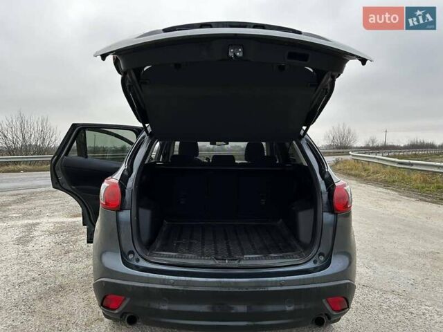 Серый Мазда СХ-5, объемом двигателя 2.19 л и пробегом 236 тыс. км за 12500 $, фото 4 на Automoto.ua