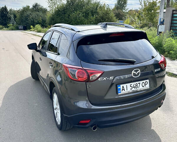 Серый Мазда СХ-5, объемом двигателя 2.5 л и пробегом 206 тыс. км за 12500 $, фото 5 на Automoto.ua
