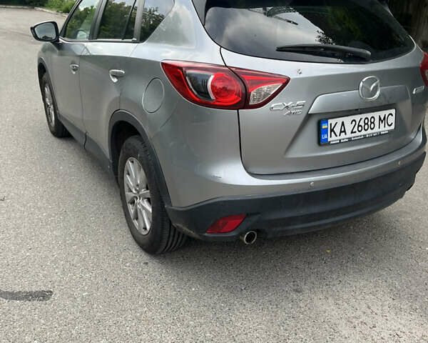 Мазда СХ-5 2013 в Киеве на Automoto.ua Серый Мазда СХ-5, объемом двигателя 2.2 л и пробегом 384 тыс. км за 13400 $, фото 6 на Automoto.ua