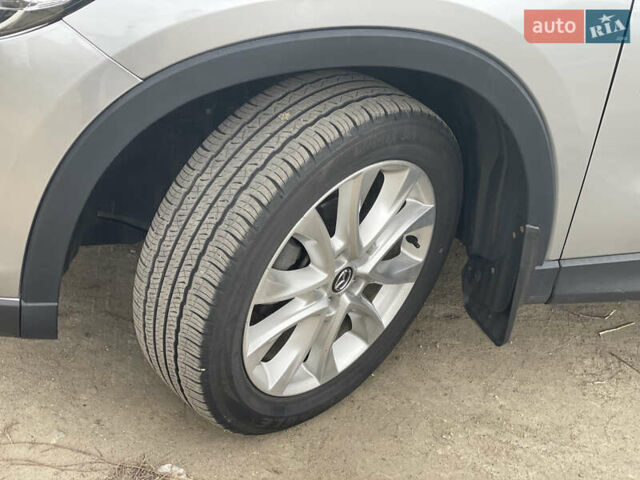 Мазда СХ-5 2013 в Николаеве на Automoto.ua Серый Мазда СХ-5, объемом двигателя 2.49 л и пробегом 165 тыс. км за 14250 $, фото 2 на Automoto.ua