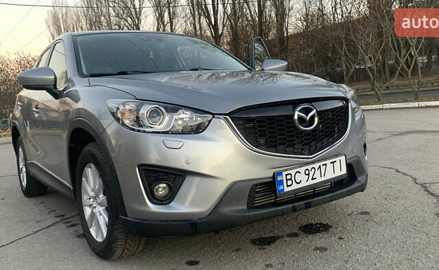 Серый Мазда СХ-5, объемом двигателя 2.19 л и пробегом 140 тыс. км за 14600 $, фото 3 на Automoto.ua