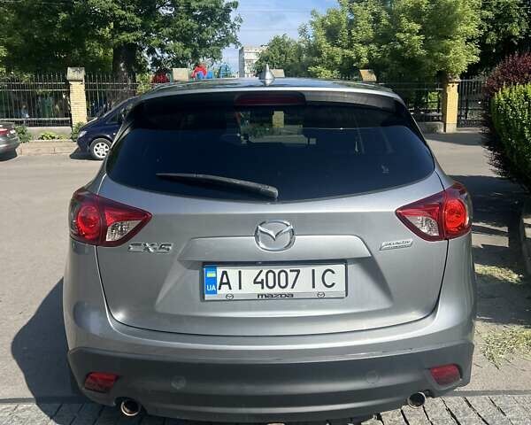 Серый Мазда СХ-5, объемом двигателя 2.49 л и пробегом 150 тыс. км за 12800 $, фото 2 на Automoto.ua