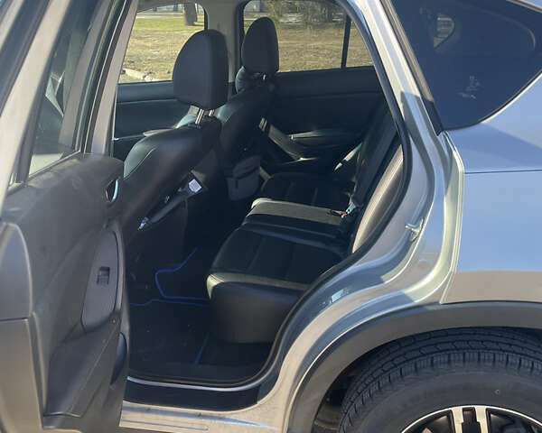 Мазда СХ-5 2013 в Николаеве на Automoto.ua Серый Мазда СХ-5, объемом двигателя 2.49 л и пробегом 165 тыс. км за 14250 $, фото 17 на Automoto.ua