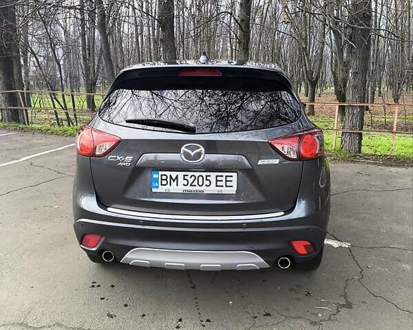Серый Мазда СХ-5, объемом двигателя 2.19 л и пробегом 248 тыс. км за 13200 $, фото 3 на Automoto.ua