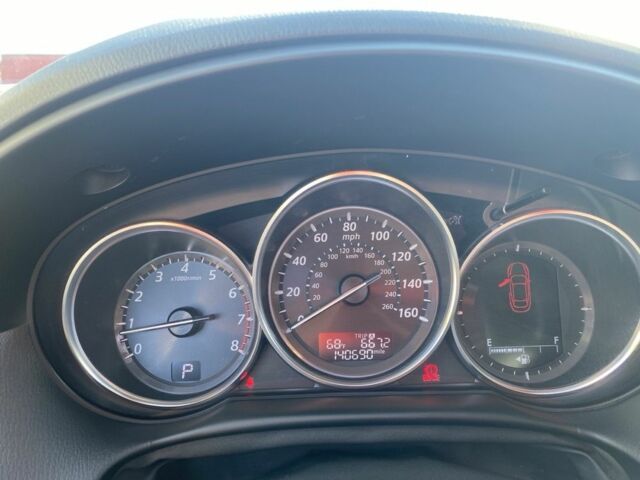 Серый Мазда СХ-5, объемом двигателя 2.5 л и пробегом 141 тыс. км за 14300 $, фото 3 на Automoto.ua