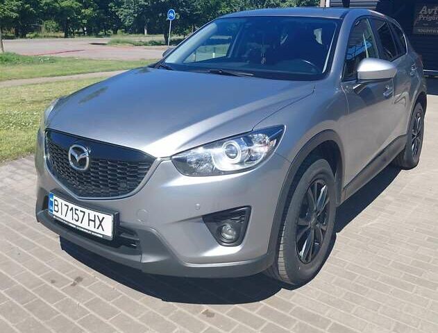Серый Мазда СХ-5, объемом двигателя 2.19 л и пробегом 142 тыс. км за 13700 $, фото 1 на Automoto.ua