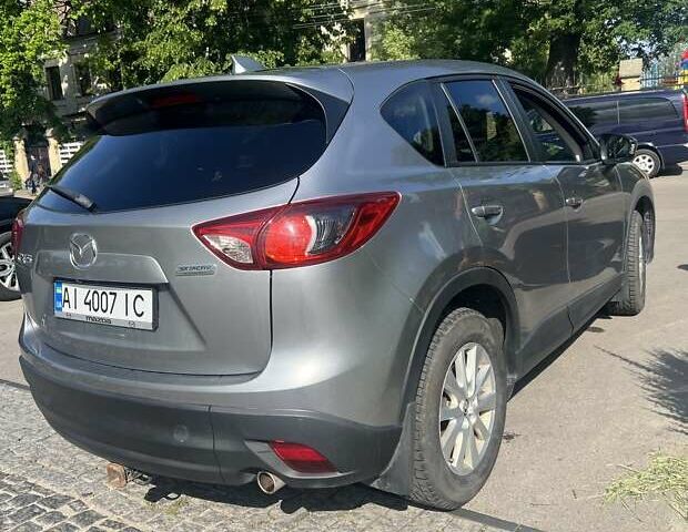 Серый Мазда СХ-5, объемом двигателя 2.49 л и пробегом 150 тыс. км за 12800 $, фото 3 на Automoto.ua