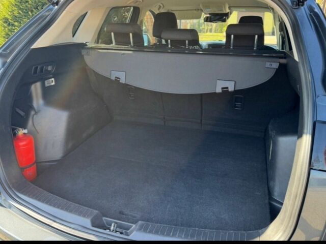 Серый Мазда СХ-5, объемом двигателя 2.2 л и пробегом 280 тыс. км за 11000 $, фото 3 на Automoto.ua