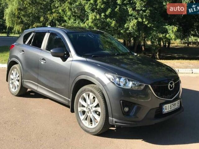 Серый Мазда СХ-5, объемом двигателя 2.19 л и пробегом 250 тыс. км за 14700 $, фото 3 на Automoto.ua