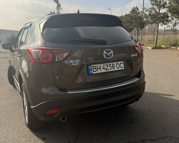 Серый Мазда СХ-5, объемом двигателя 2.49 л и пробегом 124 тыс. км за 15500 $, фото 3 на Automoto.ua
