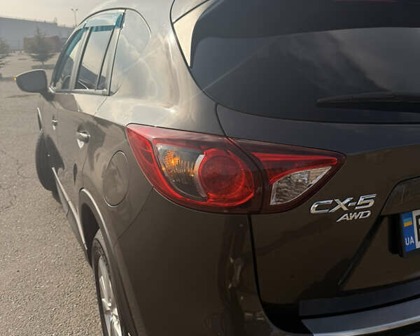 Серый Мазда СХ-5, объемом двигателя 2.49 л и пробегом 124 тыс. км за 15500 $, фото 4 на Automoto.ua