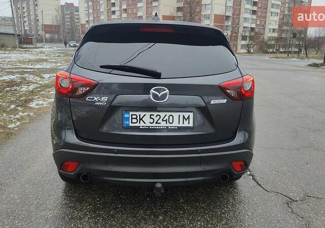 Серый Мазда СХ-5, объемом двигателя 2.2 л и пробегом 190 тыс. км за 15300 $, фото 4 на Automoto.ua