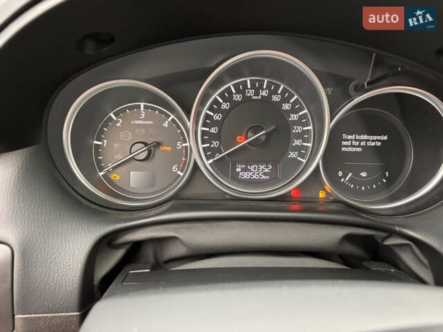 Серый Мазда СХ-5, объемом двигателя 2.19 л и пробегом 192 тыс. км за 14500 $, фото 17 на Automoto.ua