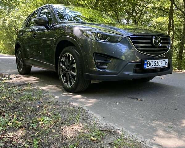 Серый Мазда СХ-5, объемом двигателя 2.19 л и пробегом 206 тыс. км за 18000 $, фото 6 на Automoto.ua