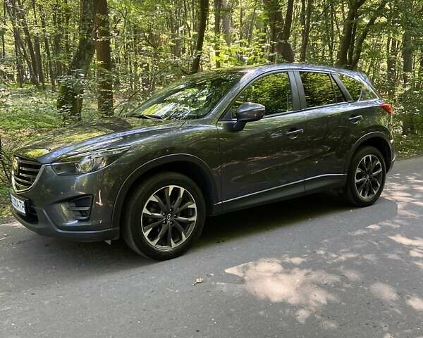 Серый Мазда СХ-5, объемом двигателя 2.19 л и пробегом 206 тыс. км за 18000 $, фото 5 на Automoto.ua