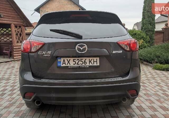 Серый Мазда СХ-5, объемом двигателя 2.49 л и пробегом 110 тыс. км за 15200 $, фото 3 на Automoto.ua