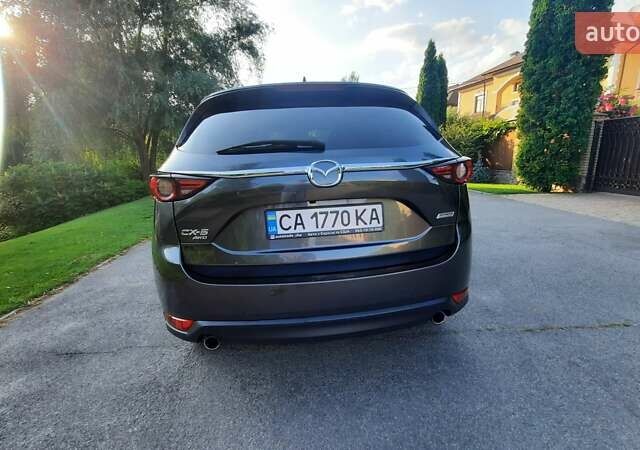 Серый Мазда СХ-5, объемом двигателя 2.49 л и пробегом 115 тыс. км за 19200 $, фото 4 на Automoto.ua