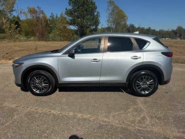 Серый Мазда СХ-5, объемом двигателя 2.5 л и пробегом 109 тыс. км за 11000 $, фото 3 на Automoto.ua