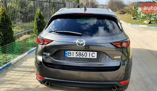 Серый Мазда СХ-5, объемом двигателя 2.49 л и пробегом 120 тыс. км за 15000 $, фото 3 на Automoto.ua