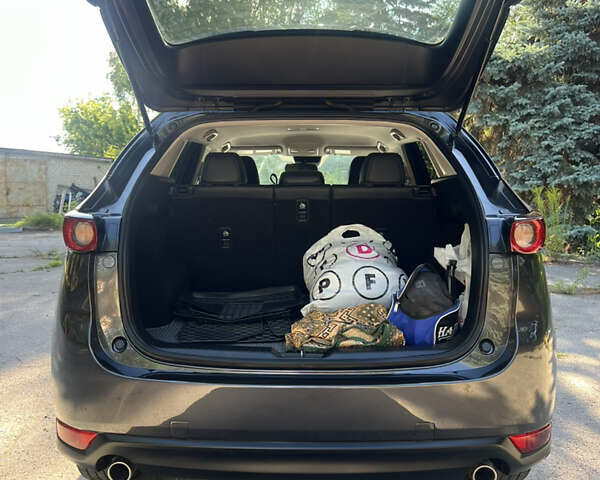 Серый Мазда СХ-5, объемом двигателя 2.49 л и пробегом 110 тыс. км за 19000 $, фото 5 на Automoto.ua