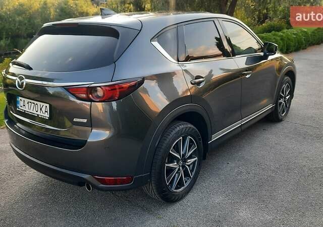 Серый Мазда СХ-5, объемом двигателя 2.49 л и пробегом 115 тыс. км за 19200 $, фото 3 на Automoto.ua