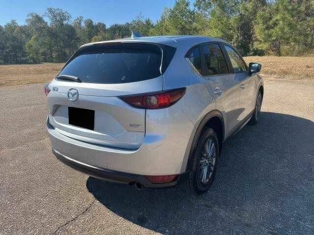 Серый Мазда СХ-5, объемом двигателя 2.5 л и пробегом 109 тыс. км за 11000 $, фото 4 на Automoto.ua