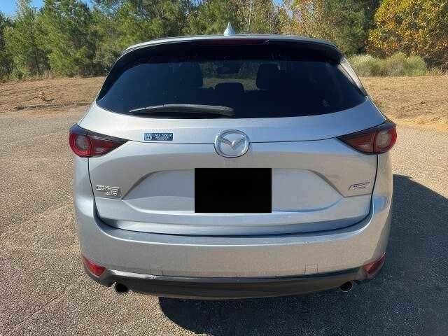 Серый Мазда СХ-5, объемом двигателя 2.5 л и пробегом 109 тыс. км за 11000 $, фото 5 на Automoto.ua