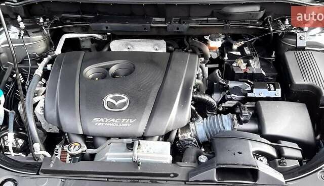 Серый Мазда СХ-5, объемом двигателя 2.49 л и пробегом 120 тыс. км за 15000 $, фото 4 на Automoto.ua