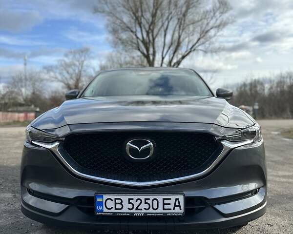 Серый Мазда СХ-5, объемом двигателя 2.49 л и пробегом 134 тыс. км за 21000 $, фото 2 на Automoto.ua