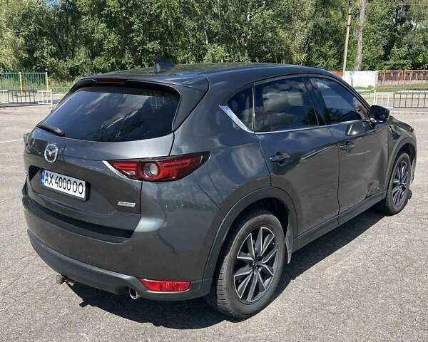 Сірий Мазда СХ-5, об'ємом двигуна 2.49 л та пробігом 100 тис. км за 19000 $, фото 3 на Automoto.ua