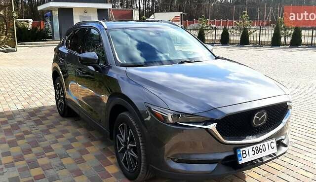 Серый Мазда СХ-5, объемом двигателя 2.49 л и пробегом 120 тыс. км за 15000 $, фото 1 на Automoto.ua