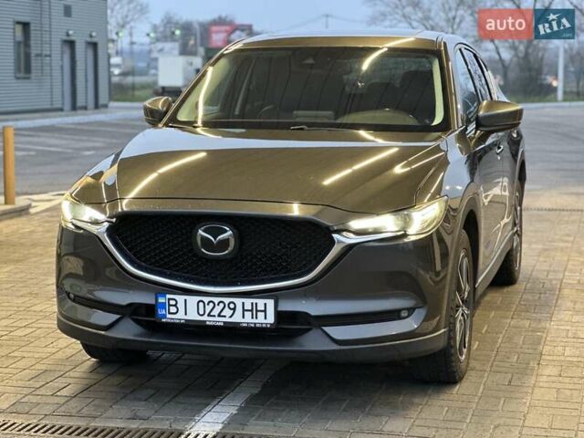 Серый Мазда СХ-5, объемом двигателя 2.49 л и пробегом 151 тыс. км за 17700 $, фото 3 на Automoto.ua