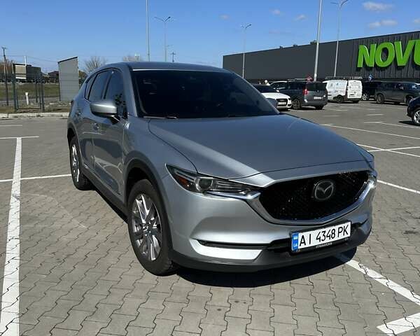 Серый Мазда СХ-5, объемом двигателя 2.49 л и пробегом 63 тыс. км за 23500 $, фото 1 на Automoto.ua