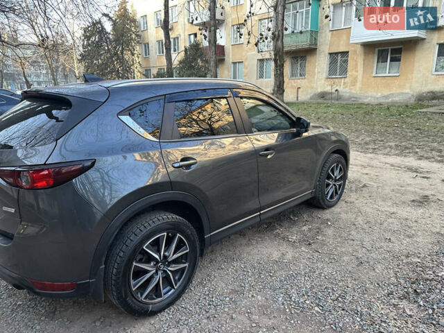 Серый Мазда СХ-5, объемом двигателя 2.49 л и пробегом 150 тыс. км за 17650 $, фото 5 на Automoto.ua