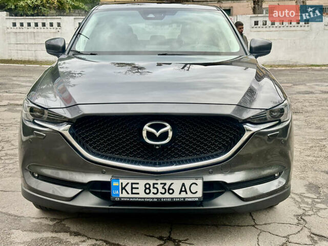 Серый Мазда СХ-5, объемом двигателя 2.19 л и пробегом 135 тыс. км за 20999 $, фото 1 на Automoto.ua