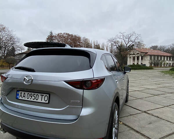 Серый Мазда СХ-5, объемом двигателя 2.19 л и пробегом 109 тыс. км за 24300 $, фото 2 на Automoto.ua