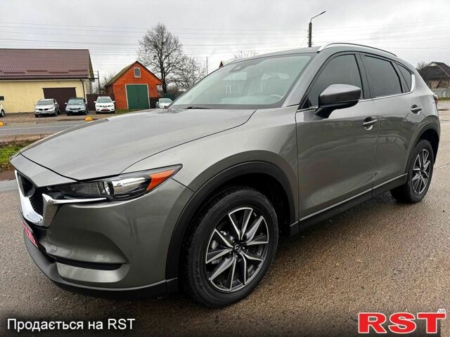 Серый Мазда СХ-5, объемом двигателя 2.5 л и пробегом 56 тыс. км за 18000 $, фото 3 на Automoto.ua