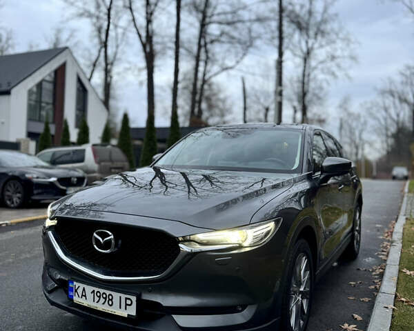 Серый Мазда СХ-5, объемом двигателя 2.49 л и пробегом 102 тыс. км за 24500 $, фото 2 на Automoto.ua