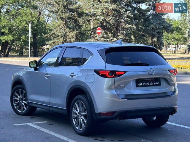 Серый Мазда СХ-5, объемом двигателя 2.49 л и пробегом 114 тыс. км за 19000 $, фото 7 на Automoto.ua