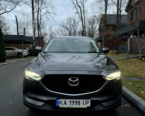 Серый Мазда СХ-5, объемом двигателя 2.49 л и пробегом 102 тыс. км за 24500 $, фото 1 на Automoto.ua