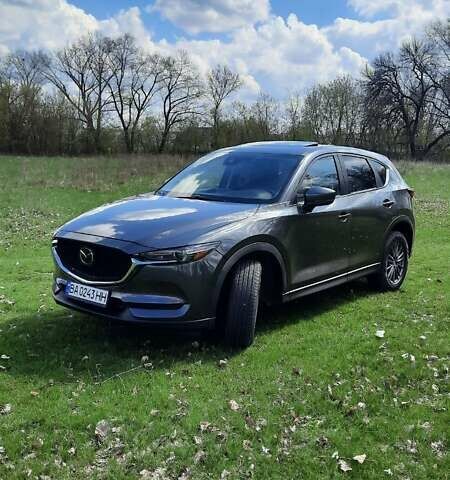 Серый Мазда СХ-5, объемом двигателя 2.49 л и пробегом 115 тыс. км за 23000 $, фото 1 на Automoto.ua