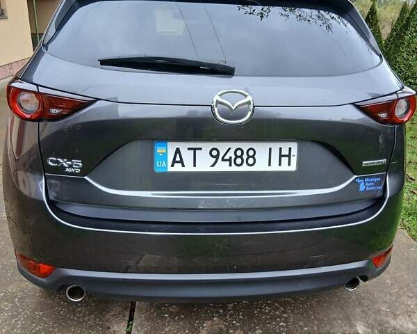 Серый Мазда СХ-5, объемом двигателя 2.49 л и пробегом 129 тыс. км за 17450 $, фото 5 на Automoto.ua