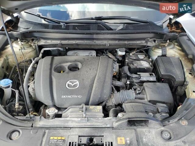 Серый Мазда СХ-5, объемом двигателя 2.49 л и пробегом 84 тыс. км за 6100 $, фото 1 на Automoto.ua