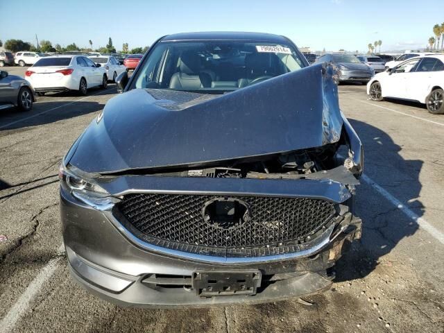 Серый Мазда СХ-5, объемом двигателя 2.5 л и пробегом 0 тыс. км за 10300 $, фото 1 на Automoto.ua