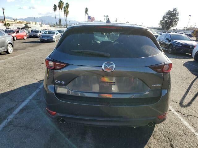 Серый Мазда СХ-5, объемом двигателя 2.5 л и пробегом 0 тыс. км за 10300 $, фото 4 на Automoto.ua