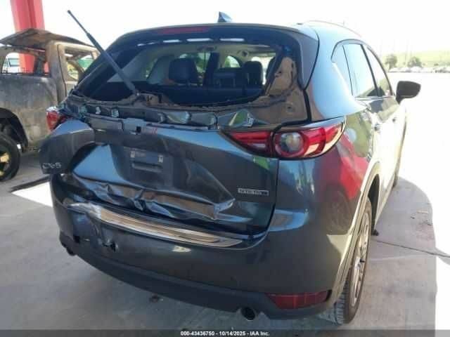 Серый Мазда СХ-5, объемом двигателя 2.5 л и пробегом 64 тыс. км за 14000 $, фото 17 на Automoto.ua