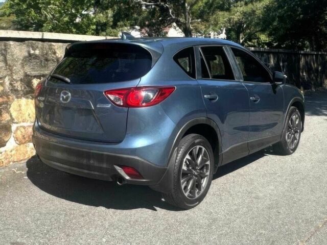 Синий Мазда СХ-5, объемом двигателя 2.5 л и пробегом 72 тыс. км за 9300 $, фото 5 на Automoto.ua