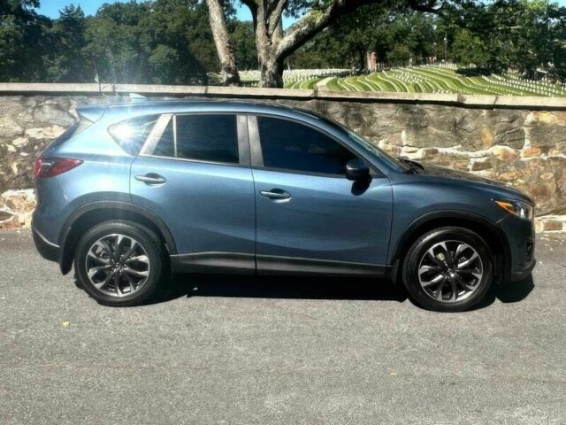 Синий Мазда СХ-5, объемом двигателя 2.5 л и пробегом 72 тыс. км за 9300 $, фото 6 на Automoto.ua